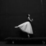 Ballet Flats - grayscale photography of ballet dancer standing on board