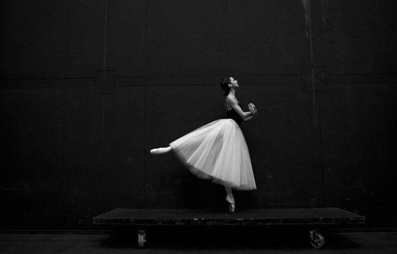 Ballet Flats - grayscale photography of ballet dancer standing on board
