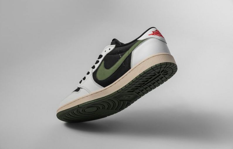 Clean Suede - a pair of white and green sneakers on a gray background