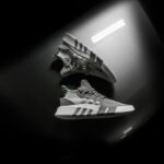 Storing Shoes - grayscale photo pair of adidas shoes