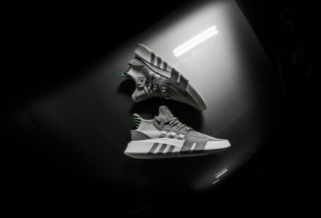 Storing Shoes - grayscale photo pair of adidas shoes