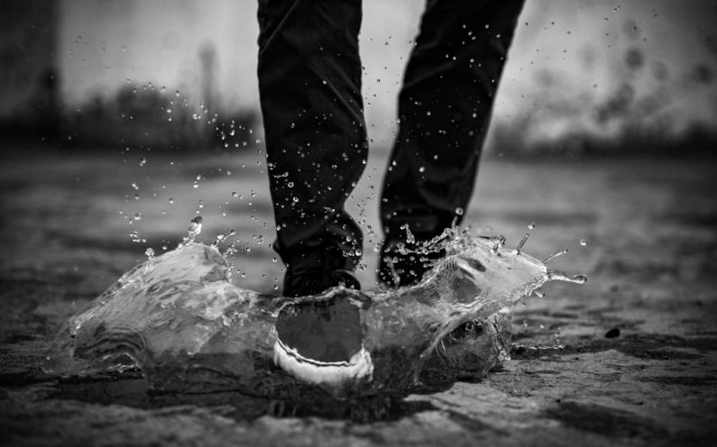 Sneaker Drops - man stepping on water