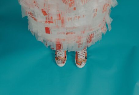 Eco Packaging Shoes - person wearing brown-and-white lace-up shoes