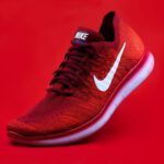 Eco Shoe Soles - unpaired red Nike sneaker