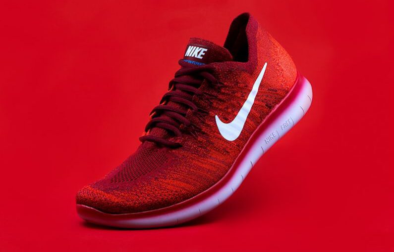 Eco Shoe Soles - unpaired red Nike sneaker