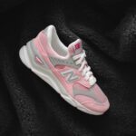 Recycling Shoes Programs - pink,grey,and white New Balance sneaker