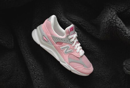 Recycling Shoes Programs - pink,grey,and white New Balance sneaker