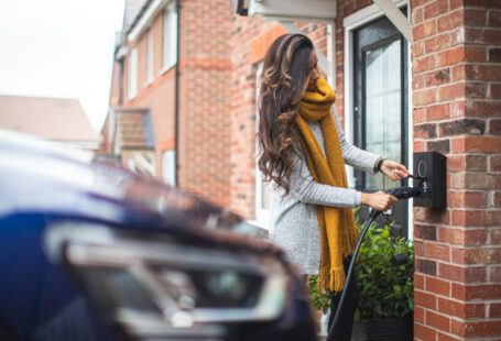 Carbon Footprint Shoes - a woman is opening the door of her house