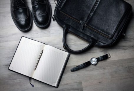 Eco Shoes - white notebook near black bag