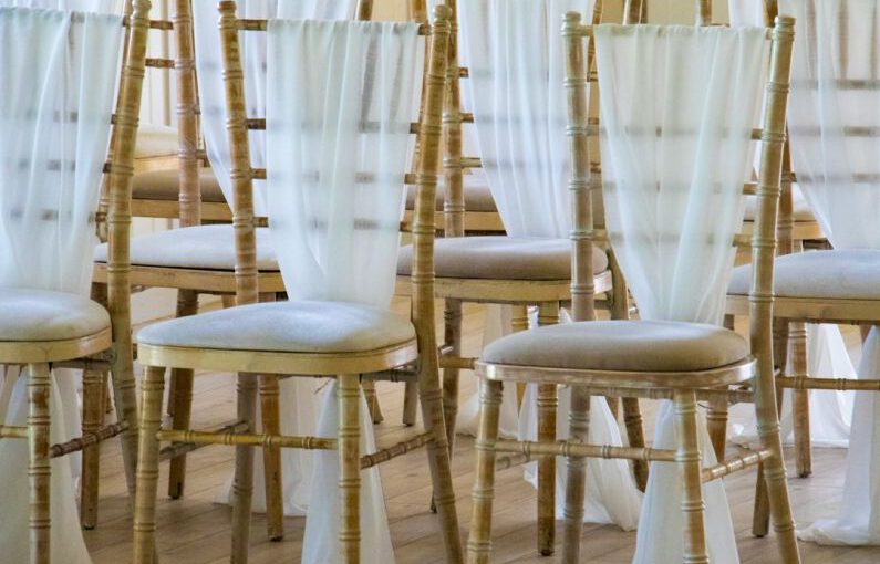 Bamboo Shoes - person showing brown bamboo-themed chairs