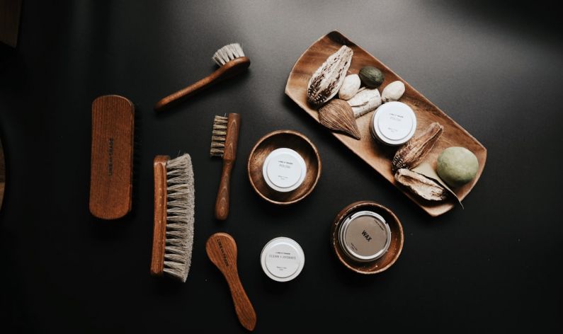 Shoe Care - hand brushes on brown plate