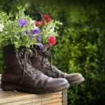 Right Shoes - a pair of boots with flowers in them