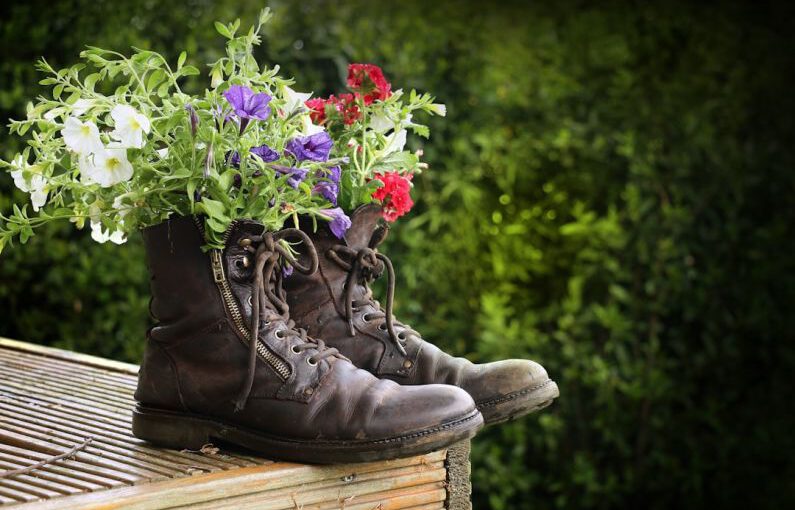 Right Shoes - a pair of boots with flowers in them