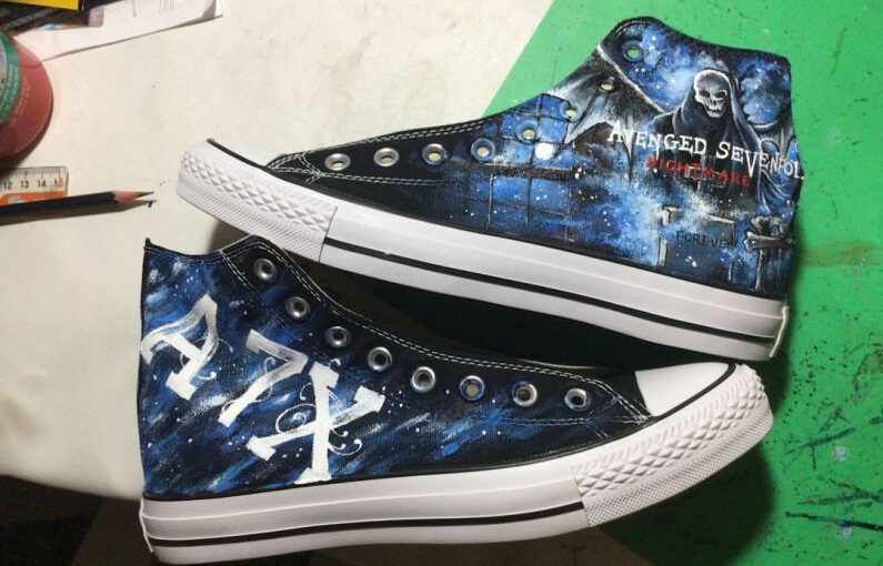 Hand-painted Shoes - a pair of black and blue painted shoes