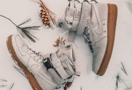 Shoe Trends - pair of gray Nike high-top sneakers on snow