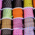 Multi-material Shoes - a bunch of different colored rope on a table