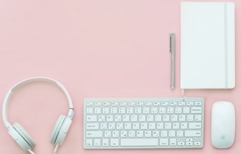 Minimalist Shoes - white Apple Magic Mouse beside of Magic Keyboard and headphones