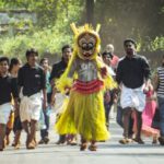 Folklore Shoes - group of people parade on the road during daytime