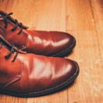 Luxury Shoe - pair of brown leather lace-up boots