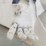 High-tech Footwear - closeup photo of white robot arm