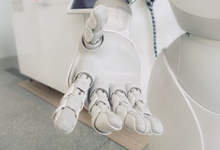 High-tech Footwear - closeup photo of white robot arm