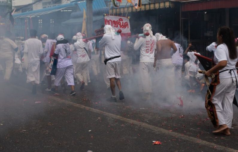 Vegan Shoes - people in white uniform walking on street during daytime